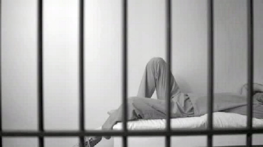 depositphotos_129170910-stock-video-man-inmate-in-prison-on